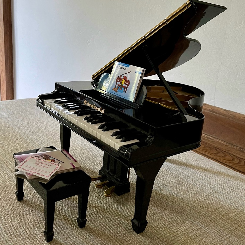 American Girl Doll baby grand piano. All books and bench included.